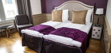 The hotel is decorated with comfortable beds and a film history theme.