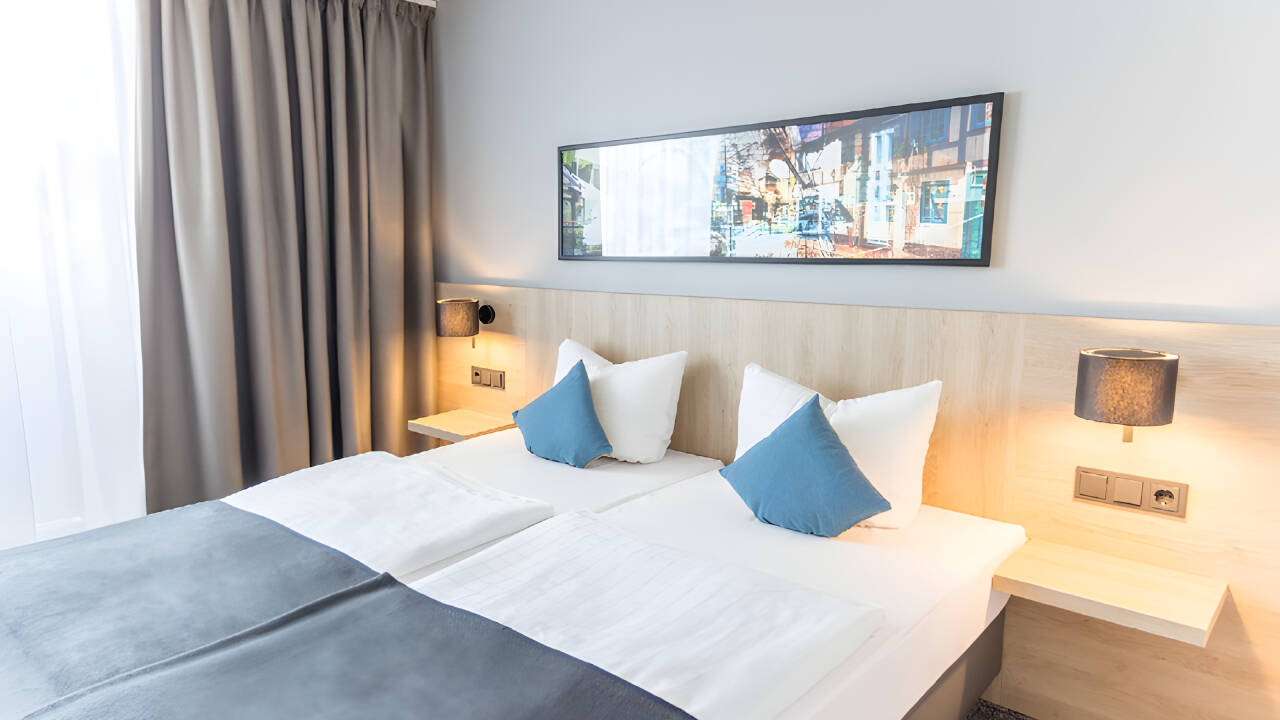Die Zimmer des Hotels sind hell und modern und bieten eine gute Basis für Ihren Aufenthalt