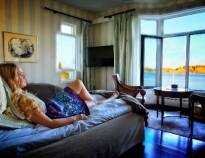 Tag på en dejlig ferie i Norge på historisk hotel med flot beliggenhed tæt på vandet.