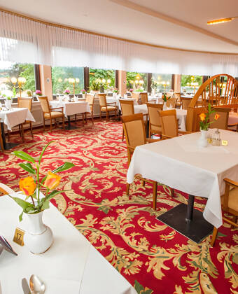 Das Restaurant des Hotels bietet eine warme und gemütliche Atmosphäre, in der Sie gut zubereitete lokale Gerichte genießen können, ohne das Hotel verlassen zu müssen.