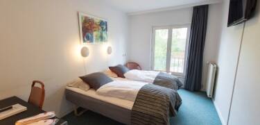 The modern rooms provide a comfortable setting for your stay.