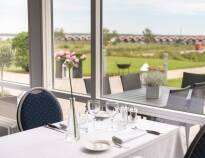 The hotel's restaurant and terrace offer a beautiful view of the area down to the water.