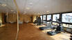 The hotel's gym is open 24 hours and has panoramic windows offering a fine view of the city.