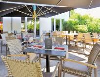 On the hotel's sun terrace you can enjoy a Bavarian speciality and a good beer, weather permitting.