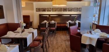 Enjoy an evening meal and try the delicious dishes the hotel restaurant has to offer.