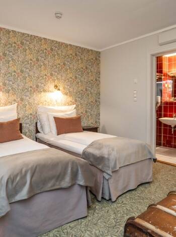 Relax in individually decorated rooms combining historic charm and modern comfort.