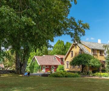 Übernachten Sie in einer historischen Villa von 1898, umgeben von friedlichen Gärten nahe Sandnes.