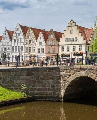 Friedrichstadt with its special houses and all the canals is worth a visit.
