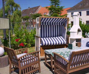 Sie können die Terrasse des Hotels genießen, die direkt an den Grachten liegt.