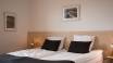 The hotel's double rooms offer plenty of space in a cosy, homely setting.