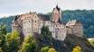 Dra på utflukt til den lille landsbyen Loket og opplev byens imponerende gotiske slottet