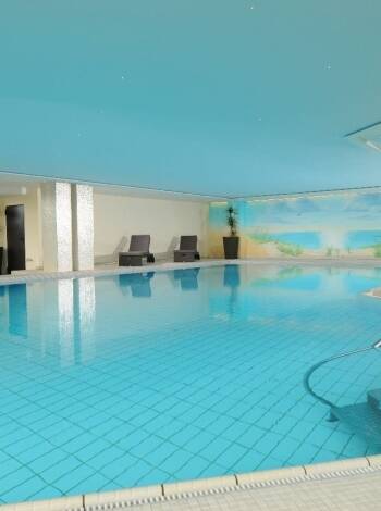 The modern and bright rooms all have their own balcony and views of the beautiful surroundings