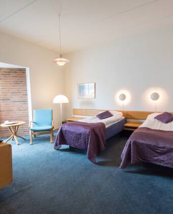 The hotel rooms are nice and bright.