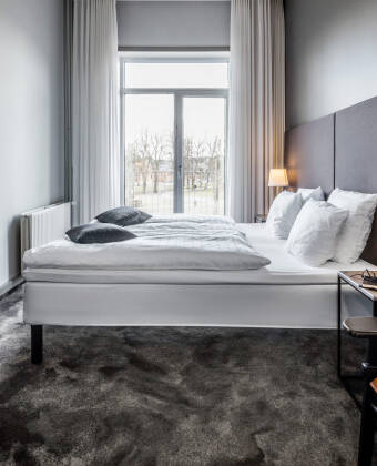 Book one of the modern double rooms in Scandic The Mayor Hotel.