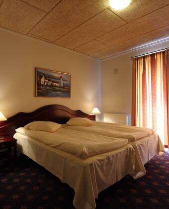 All of the hotel's lovely rooms have private bathrooms and access to a private terrace