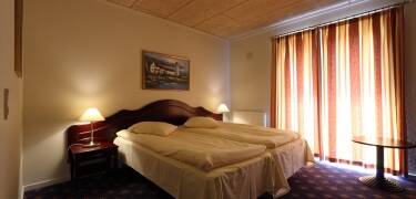 All of the hotel's lovely rooms have private bathrooms and access to a private terrace