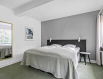 Här inkvarteras ni i stilfulla och fina rum med hög komfortnivå och bekväm möblering.