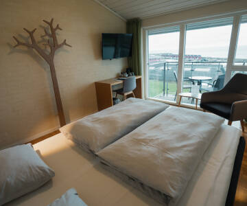 Schlafen Sie zu Meeresrauschen ein und wählen Sie ein Zimmer mit wunderschönem Meerblick.