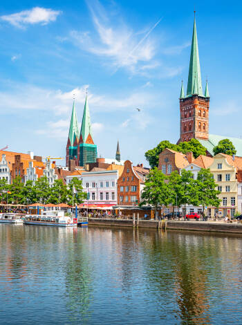 Lübeck Old Town island reveals port city charm between the Trave Wakenitz and canal.