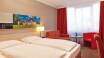 Hotellrommene tilbyr en hyggelig og behagelig setting for ditt opphold.