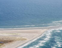 Go to the very tip of Denmark, Grenen, where the seas part.