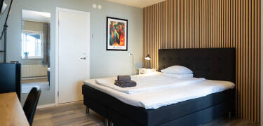 Hotellets værelser udgør en komfortabel under opholdet i Markaryd.