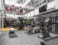 Hotel facilities include a well-equipped gym and a relaxation area with a sauna.