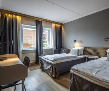 De velindrettede værelser har gode senge og praktiske detaljer for en afslappet nat.