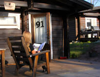 The hotel's idyllic log cabins are a perfect place to relax and enjoy the lovely surroundings.