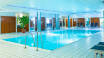 På dette 4-stjernes hotellet har dere både tilgang til innendørs svømmebasseng, sauna og fitness-senter.