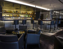 Enjoy the atmosphere and a drink in the hotel's atmospheric bar or in the cosy smoking lounge.