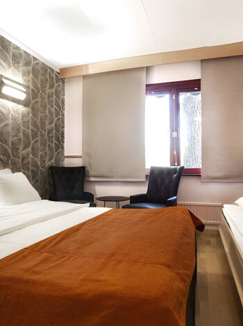 Bei Olsen Reisen wird Ihnen eine Unterkunft in angenehmen Standardzimmern des Hotels angeboten.