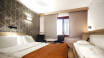 Bei Olsen Reisen wird Ihnen eine Unterkunft in angenehmen Standardzimmern des Hotels angeboten.