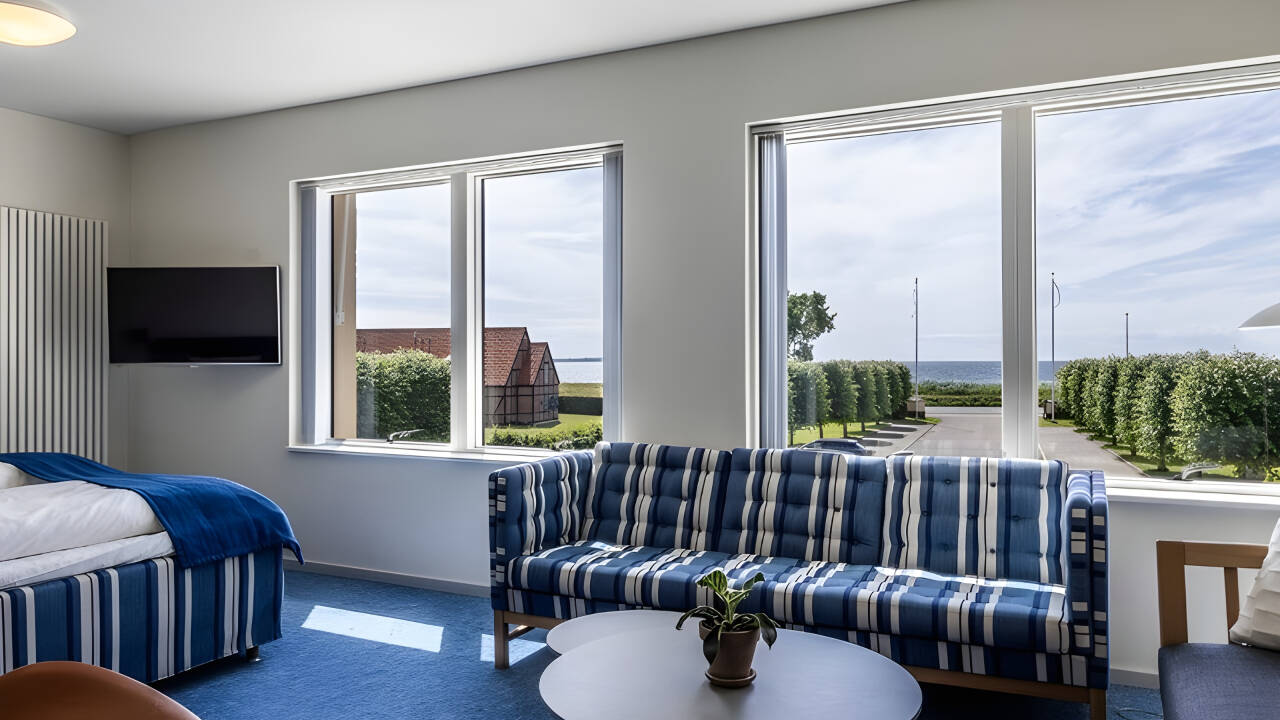 Enjoy the cozy atmosphere of a classic beach hotel. For lovely sea views, try upgrading to a Luxury Double Room with a balcony.