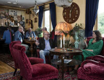 Relax in the comfortable armchairs or discover the other cosy rooms in the hotel. There is a smoking room.