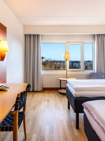 Die hellen, modern eingerichteten Zimmer sorgen dafür, dass Sie sich gleich wie zu Hause fühlen.