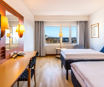 Die hellen, modern eingerichteten Zimmer sorgen dafür, dass Sie sich gleich wie zu Hause fühlen.