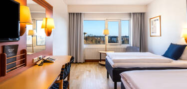 Die hellen, modern eingerichteten Zimmer sorgen dafür, dass Sie sich gleich wie zu Hause fühlen.