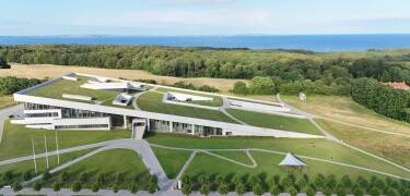 Aarhus bietet viele Sehenswürdigkeiten wie die Altstadt, Marselisborg, das Moesgaard-Museum und Tivoli Friheden.