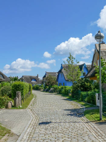 Drive around the beautiful landscapes of the Wittow peninsula and visit charming fishing villages.