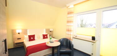 Du vil føle dig hjemme i de kærligt indrettede, hyggelige værelser.