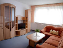 Rommene på Apartment hotel-Harz har TV, eget bad, balkong og fullt utstyrt kjøkken.