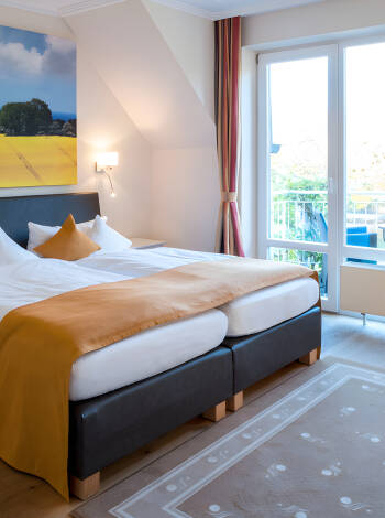 You can choose between the hotel's economy, superior or deluxe rooms.