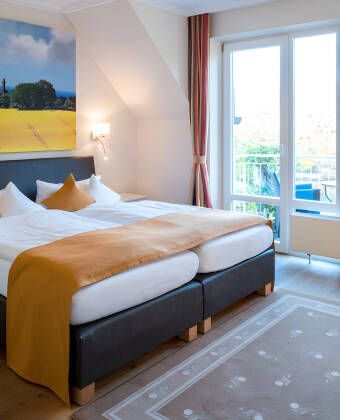You can choose between the hotel's economy, superior or deluxe rooms.