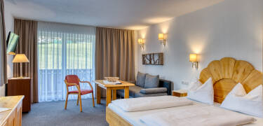 All of the hotel's rooms offer a modern and cosy setting for your stay in Tyrol.