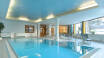 Hotellets wellnessområde omfatter både en swimmingpool, flere saunaer, infrarød kabine og et Kneipp-basin.
