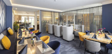 Nyd regionale, middelhavs- og sæsonbetonede retter i restauranten.