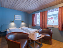Här erbjuds ni en god natts sömn i ljusa och bekvämt inredda rum i de norska fjällen.
