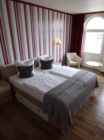 The rooms of the hotel are simply and comfortably furnished.