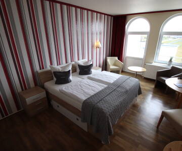 Die Zimmer des Hotels sind einfach und komfortabel eingerichtet.